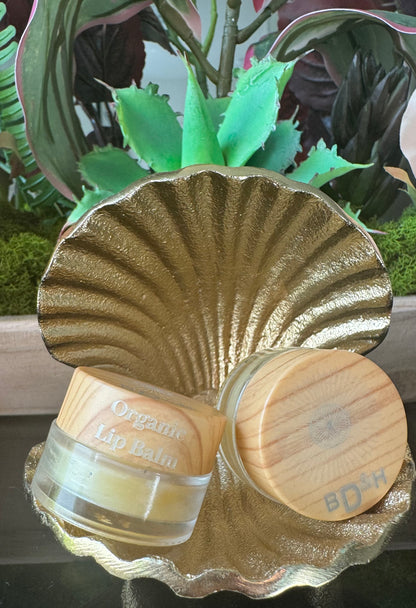 Organic soothing lip balm in a 5ml jar, handmade with 100% water-free raw botanicals and candelilla wax locally in McKinney Texas.